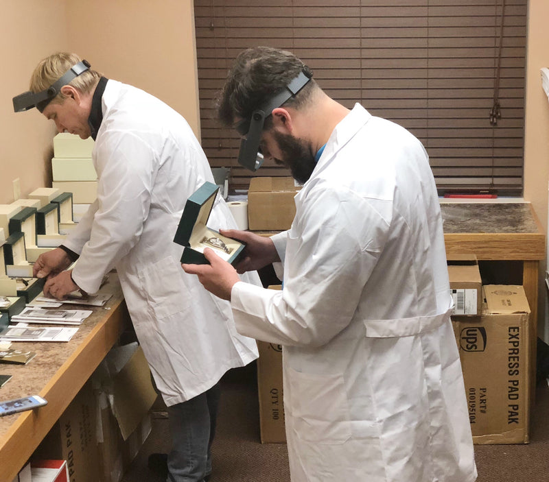 Sant Blanc inspecting watches — Learn About Sant Blanc